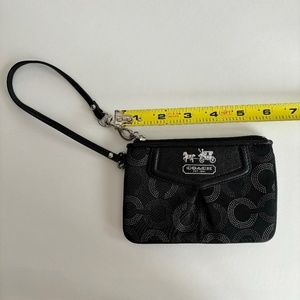 Black Coach wristlet with silver C detailing